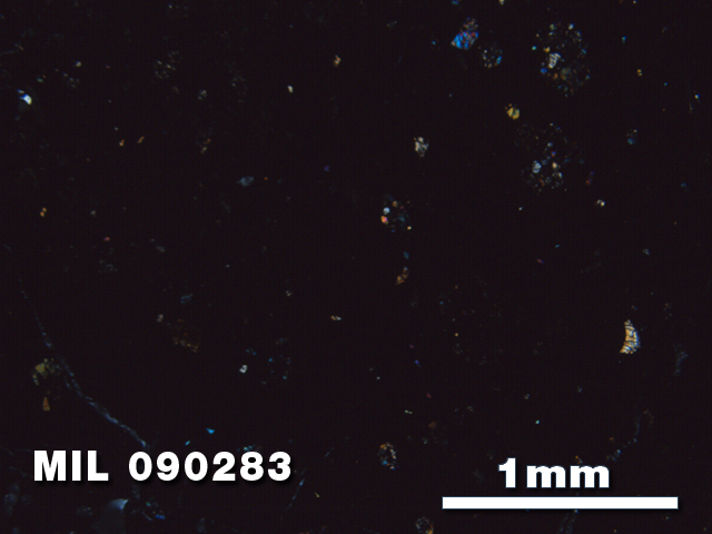 Thin Section Photo of Sample MIL 090283 in Cross-Polarized Light with 2.5X Magnification