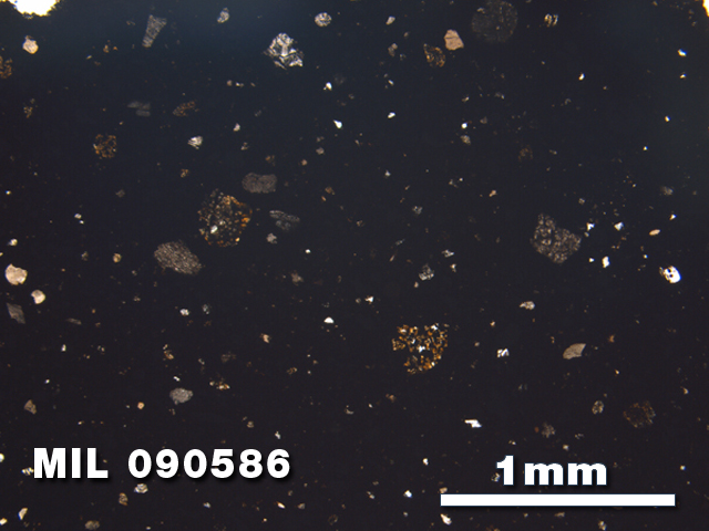 Thin Section Photo of Sample MIL 090586 in Plane-Polarized Light with 2.5X Magnification