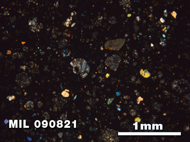 Thin Section Photo of Sample MIL 090821 in Cross-Polarized Light with 2.5X Magnification
