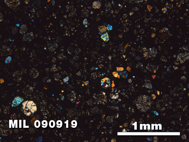 Thin Section Photo of Sample MIL 090919 in Cross-Polarized Light with 2.5X Magnification