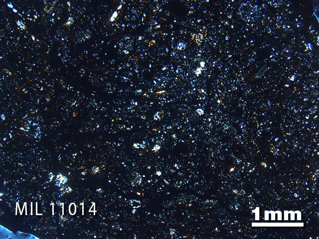 Thin Section Photo of Sample MIL 11014 in Cross-Polarized Light with 1.25x Magnification