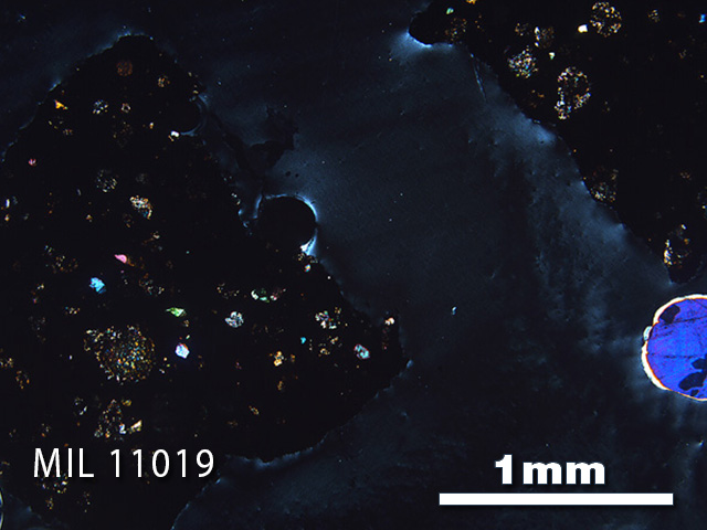 Thin Section Photo of Sample MIL 11019 in Cross-Polarized Light with 2.5x Magnification