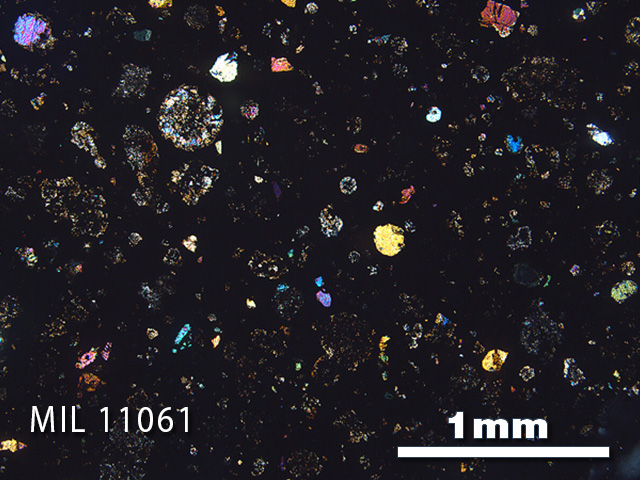 Thin Section Photo of Sample MIL 11061 in Cross-Polarized Light with 2.5x Magnification