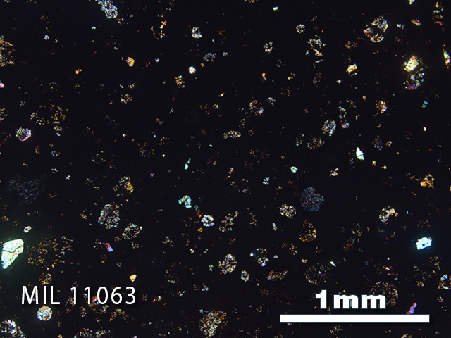 Thin Section Photo of Sample MIL 11063 in Cross-Polarized Light with 2.5x Magnification