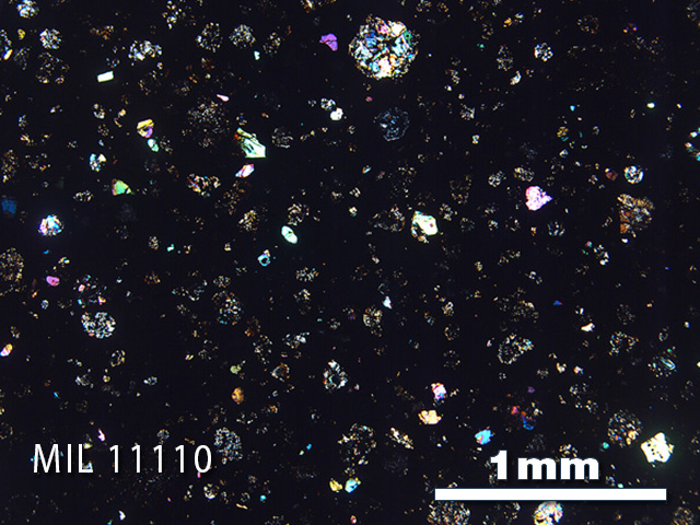 Thin Section Photo of Sample MIL 11110 in Cross-Polarized Light with 2.5x Magnification
