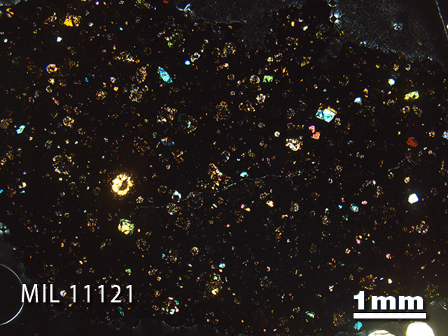 Thin Section Photo of Sample MIL 11121 in Cross-Polarized Light with 1.25x Magnification
