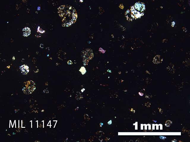 Thin Section Photo of Sample MIL 11147 in Cross-Polarized Light with 2.5x Magnification