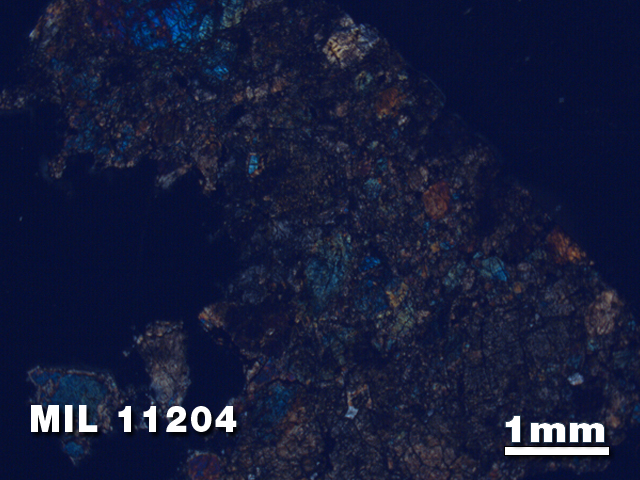 Thin Section Photo of Sample MIL 11204 in Cross-Polarized Light with 1.25X Magnification