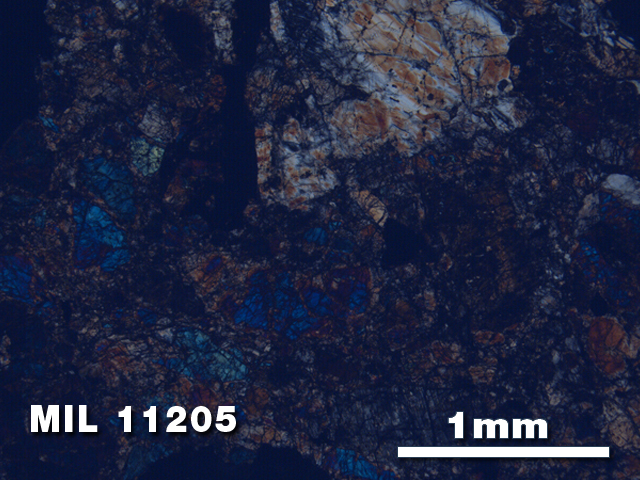 Thin Section Photo of Sample MIL 11205 in Cross-Polarized Light with 2.5X Magnification