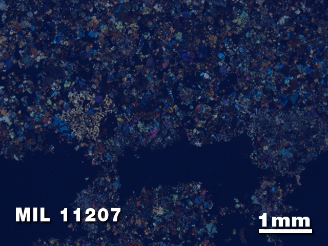 Thin Section Photo of Sample MIL 11207 in Cross-Polarized Light with 1.25X Magnification