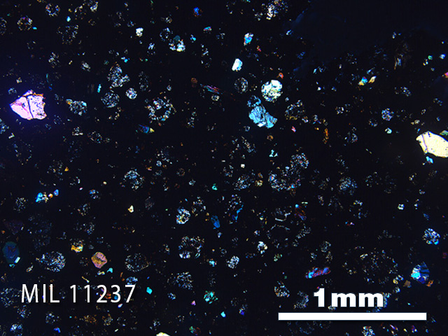 Thin Section Photo of Sample MIL 11237 in Cross-Polarized Light with 2.5x Magnification