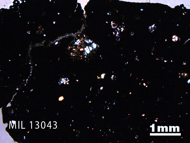 Thin Section Photo of Sample MIL 13043 in Cross-Polarized Light with 1.25X Magnification