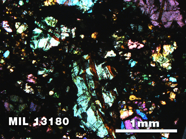 Thin Section Photo of Sample MIL 13180 in Cross-Polarized Light with 2.5X Magnification