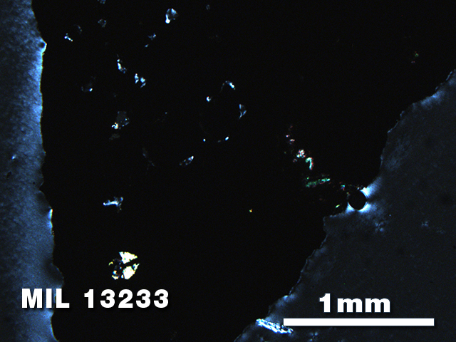 Thin Section Photo of Sample MIL 13233 in Cross-Polarized Light with 2.5X Magnification