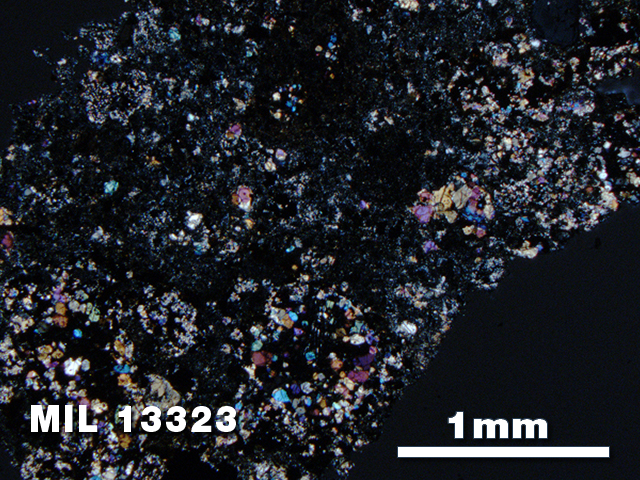 Thin Section Photo of Sample MIL 13323 in Cross-Polarized Light with 2.5X Magnification