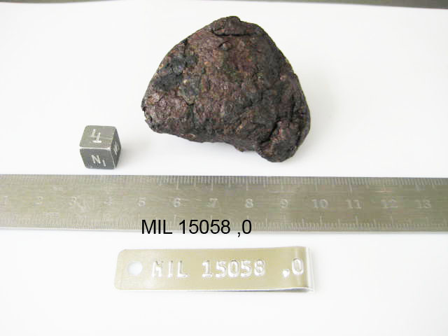 Lab Photo of Sample MIL 15058 Displaying Top North Orientation