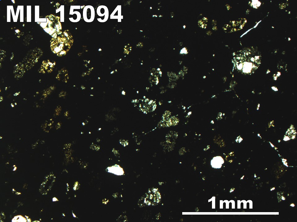 Thin Section Photo of Sample MIL 15094 in Plane-Polarized Light with 2.5X Magnification
