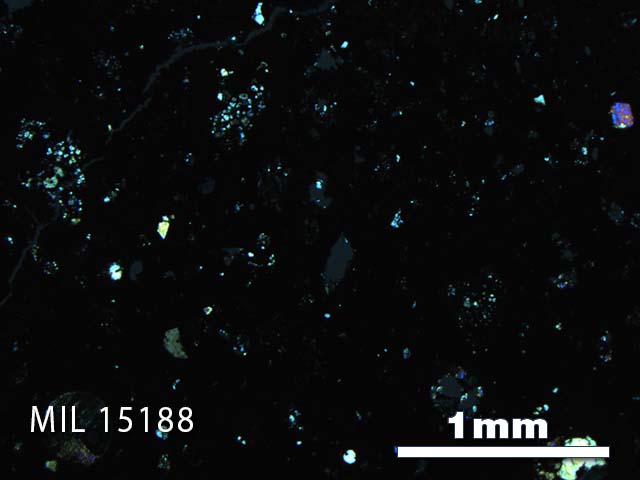 Thin Section Photo of Sample MIL 15188 in Cross-Polarized Light with 2.5X Magnification