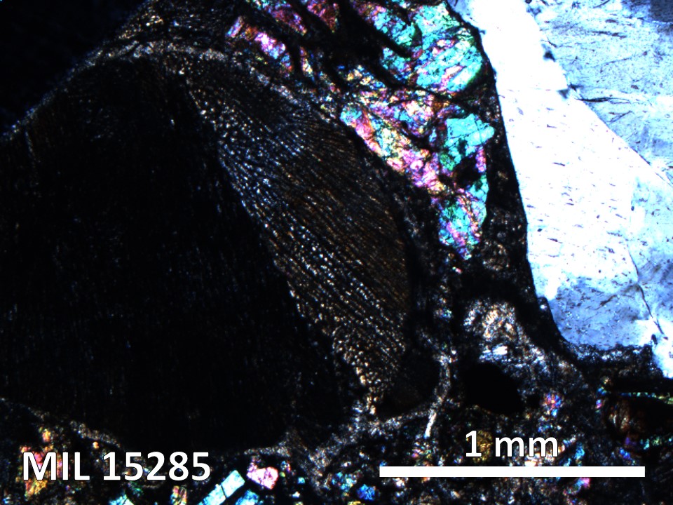 Thin Section Photo of Sample MIL 15285 in Cross-Polarized Light with 5X Magnification