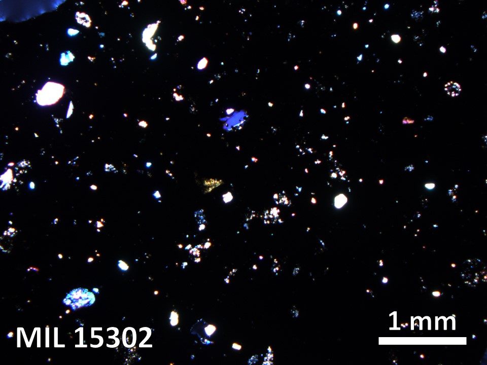 Thin Section Photo of Sample MIL 15302 in Cross-Polarized Light with 2.5X Magnification