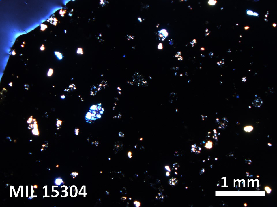 Thin Section Photo of Sample MIL 15304 in Cross-Polarized Light with 2.5X Magnification