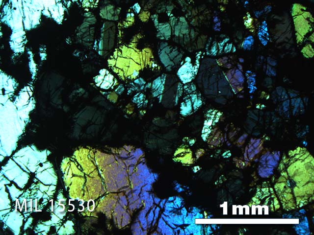 Thin Section Photo of Sample MIL 15530 in Cross-Polarized Light with 2.5X Magnification