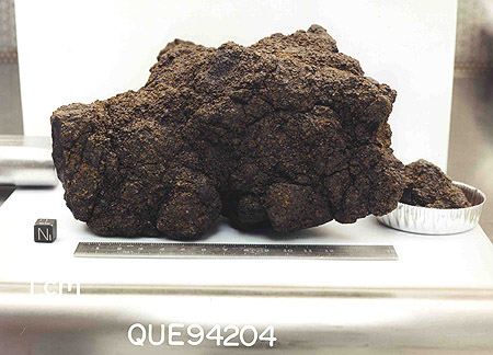 Lab Photo of Sample QUE 94204 Showing Bottom View