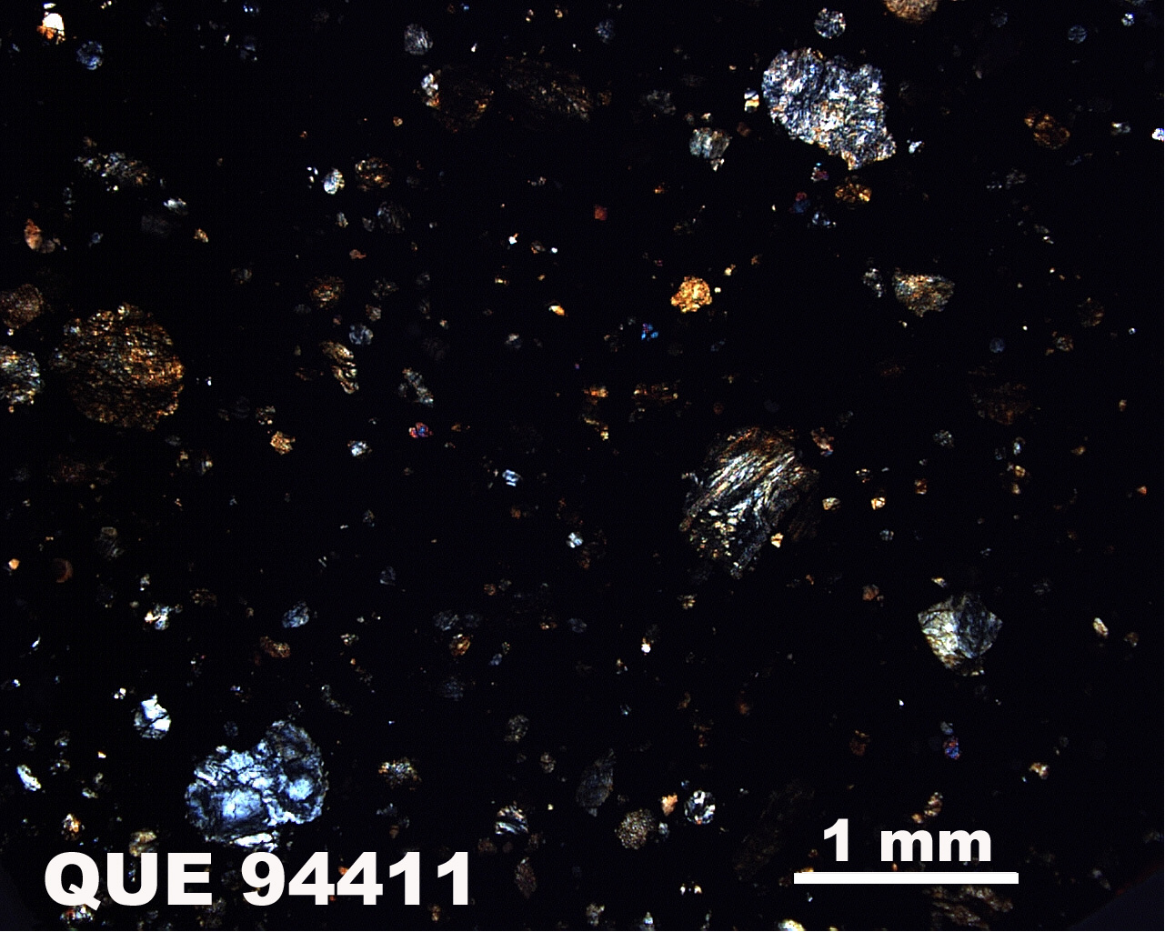 Thin Section Photo of Sample QUE 94411 in Cross-Polarized Light