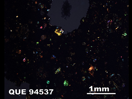 Thin Section Photograph of Sample QUE 94537 in Cross-Polarized Light