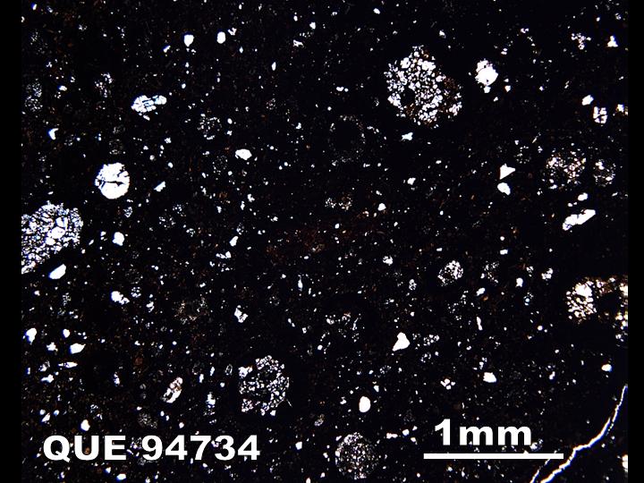 Thin Section Photo of Sample QUE 94734 in Plane-Polarized Light