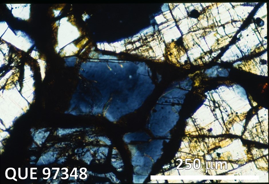 Thin Section Photo of Sample QUE 97348 in Cross-Polarized Light with 10X Magnification