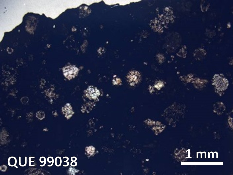 Thin Section Photo of Sample QUE 99038 in Plane-Polarized Light with  Magnification
