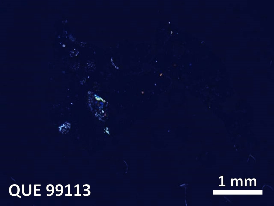 Thin Section Photo of Sample QUE 99113 in Cross-Polarized Light with  Magnification