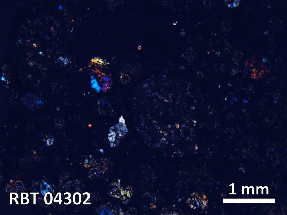 Thin Section Photo of Sample RBT 04302 in Cross-Polarized Light with  Magnification