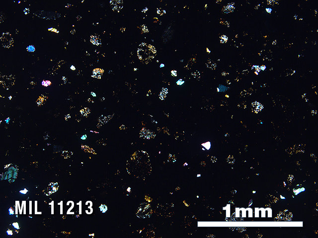 Thin Section Photo of Sample MIL 11213 in Cross-Polarized Light with 2.5X Magnification