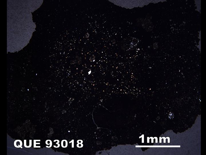 Thin Section Photograph of Sample QUE 93018 in Cross-Polarized Light