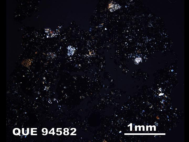 Thin Section Photo of Sample QUE 94582 in Cross-Polarized Light