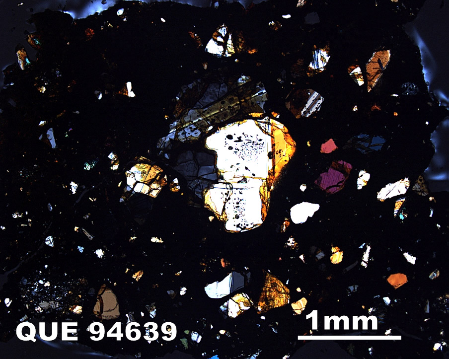 Thin Section Photograph of Sample QUE 94639 in Cross-Polarized Light