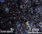 Thin Section Photograph of Sample DOM 08002 in Cross-Polarized Light
