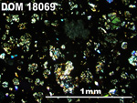 Thin Section Photo of Sample DOM 18069 in Cross-Polarized Light with 5X Magnification