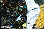 Thin Section Photo of Sample EET 96002 in Cross-Polarized Light with 2.5X Magnification