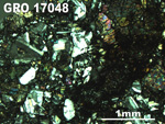 Thin Section Photo of Sample GRO 17048 in Cross-Polarized Light with 2.5X Magnification