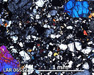 LAR 06512 Meteorite Thin Section Photo with 5x magnification in Cross-Polarized Light
