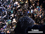 Thin Section Photo of Sample LAR 12034 in Cross-Polarized Light with 2.5X Magnification