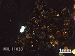 Thin Section Photo of Sample MIL 11033 in Cross-Polarized Light with 1.25x Magnification