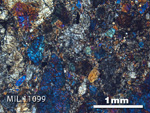 Thin Section Photo of Sample MIL 11099 in Cross-Polarized Light with 2.5X Magnification