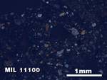 Thin Section Photo of Sample MIL 11100 in Cross-Polarized Light with 2.5X Magnification