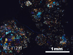 Thin Section Photo of Sample MIL 11231 in Cross-Polarized Light with 2.5x Magnification