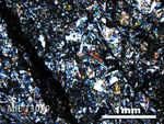 Thin Section Photo of Sample MIL 13019 in Cross-Polarized Light with 2.5X Magnification