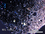 Thin Section Photo of Sample MIL 13062 in Cross-Polarized Light with 2.5X Magnification